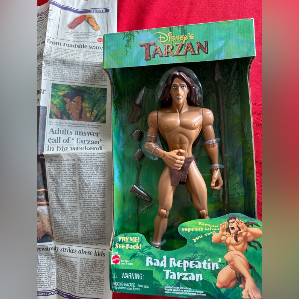 TARZAN banned 1999 action figure. With Newspaper articles. Never opened.